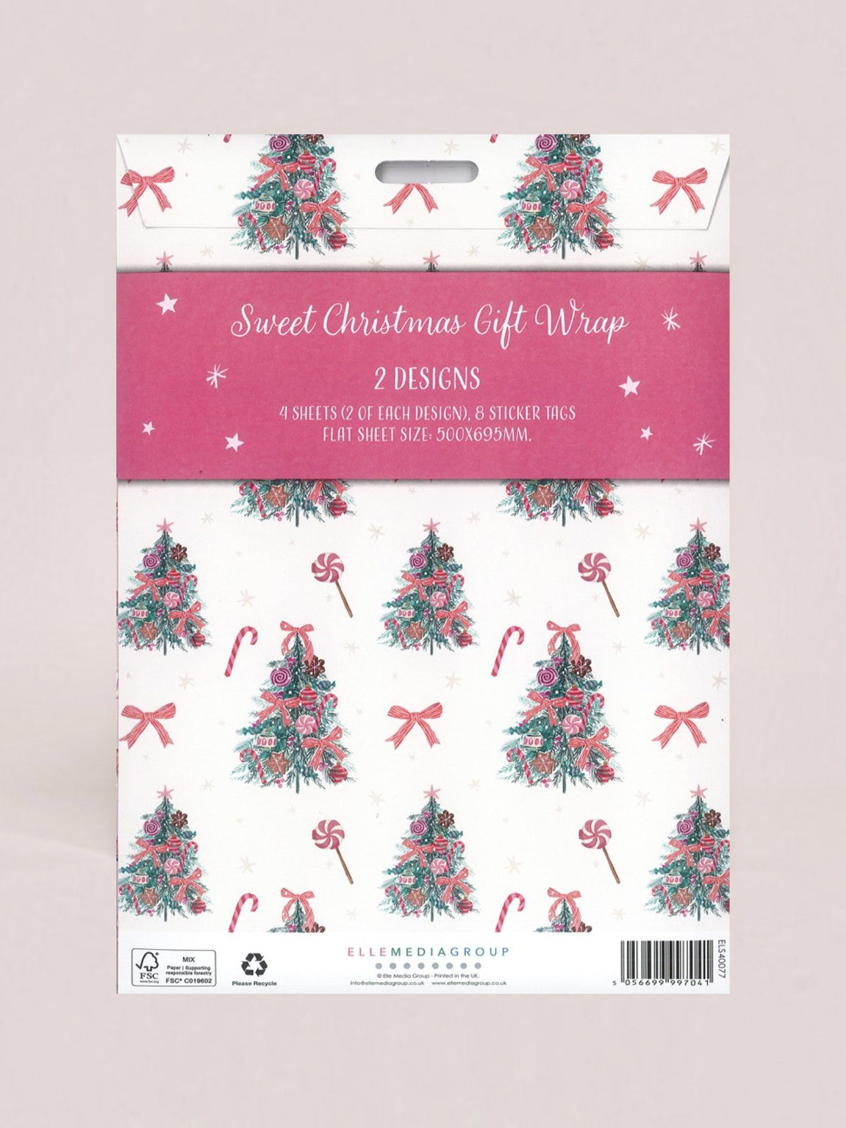 A packaged sheet of Christmas gift wrap with a pink header card reading 'Sweet Christmas Gift Wrap' and '2 DESIGNS.' The wrap pattern shows teal Christmas trees, pink bows, candy canes, and small white stars on a white background.